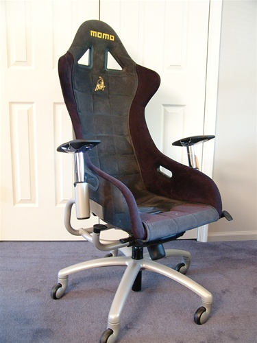 Illustration for article titled Race Car Chairs Give You Office Pole Position